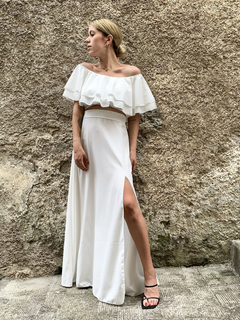 Coordinato con top drappeggiato e gonna midi in raso