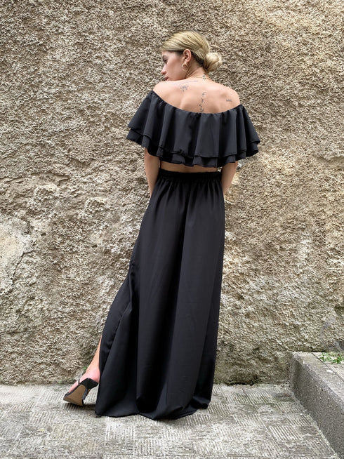 Coordinato con top drappeggiato e gonna midi in raso