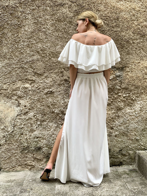 Coordinato con top drappeggiato e gonna midi in raso