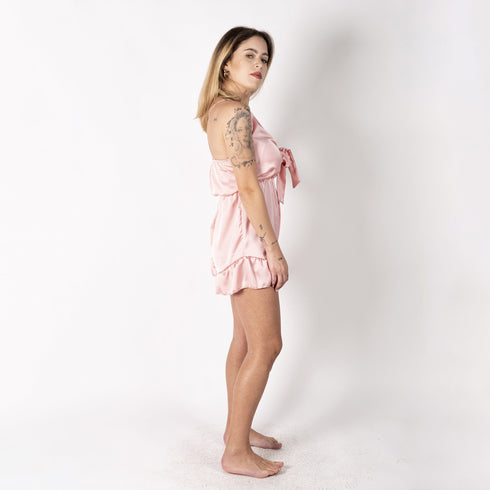 Pigiama a tutina con bretelle sottili rosa con fiocco